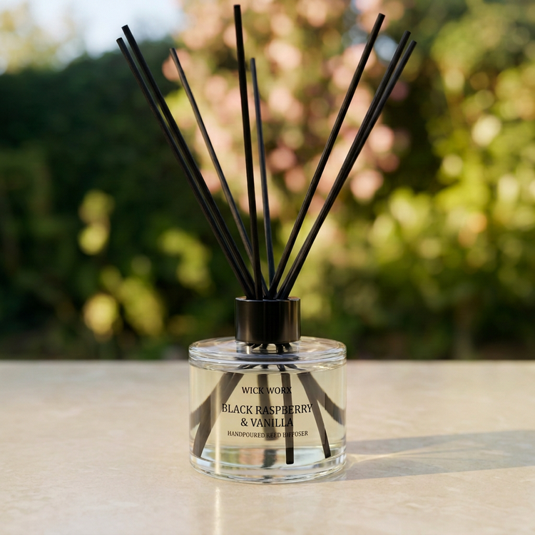 Reed diffuser image with Black Raspberry & Vanilla label