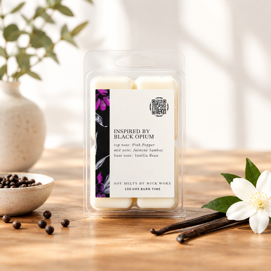 Wax melts styled against a soft white wall in warm natural daylight